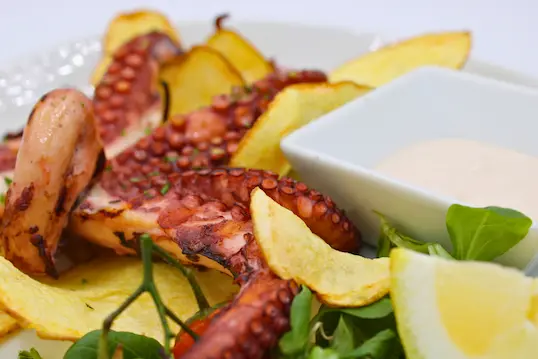 Polpo con patate il Portico Stintino